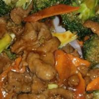 Broccoli Beef · Tender beef strips w. broccoli, carrot, and onion stir fried in a brown sauce.