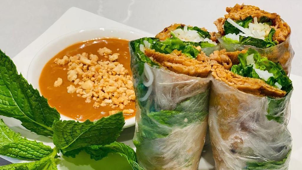 Bbq Spring Rolls · 2 pieces. Choices of charbroiled protein, vermicelli noodles and shredded lettuce wrapped in rice paper and served with a house made peanut sauce.