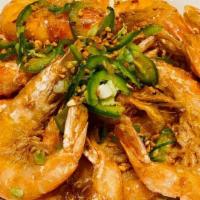 Crispy Shrimp With Salt And Pepper · Fried shrimp tossed with garlic chips.