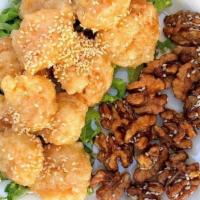 Honey Walnut Shrimp · Crispy, fried shrimp coated in a creamy sweet sauce and topped with candied walnuts.
