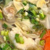 Wor Wonton Soup · Wontons stuffed with minced pork and shrimp served in a rich broth with vegetables and slice...