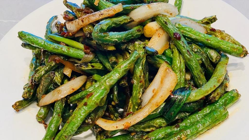 Xo String Beans · String beans stir fried with a house-made spicy seafood sauce.