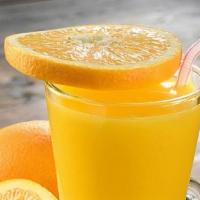 Fresh Orange Juice · Fresh squeezed orange juice poured over ice.