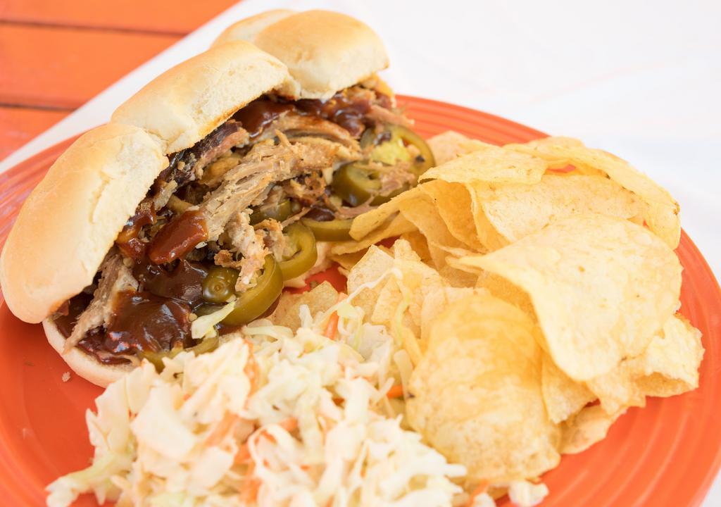 Three Slider Plate · Slow cooked shredded pork, sweet & spicy BBQ sauce, spicy jalapeños, & topped with crispy fried onions. Served with chips and coleslaw.