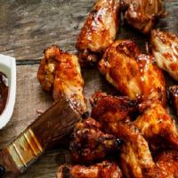 Honey Bbq Wings · Bone-in chicken wings fried until crispy and golden, tossed in sweet and tangy barbecue sauc...