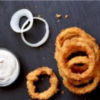 Onion Rings · Beer batter dipped onion slices fried until crispy and golden. Vegetarian.