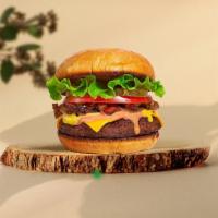 Your Own Trade Burger  · Seasoned vegan plant-based patty topped with your favorite choice of toppings! Served on a b...