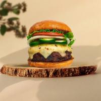 Hot Stuff Jalapeno Burger  · Seasoned plant-based patty topped with melted vegan cheese, jalapenos, lettuce, tomato, onio...