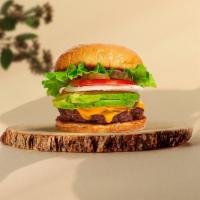 You Guac My World Burger  · Seasoned plant-based patty topped with avocado, melted vegan cheese, lettuce, tomato, onion,...
