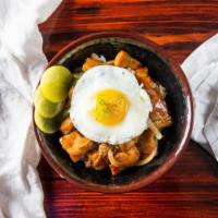 Pork Belly Bowl · White rice topped with pork belly meat with bbq sauce, vegetables, and a fried egg.