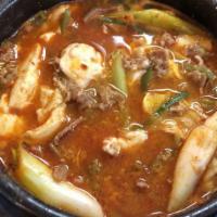 Soon Tofu · Soft tofu soup with your selection of seafood, pork, or beef, topped with an egg.