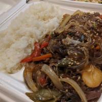 Japchae · Sweet potato noodles are stir-fried with Japchae sauce, bell peppers, and beef.