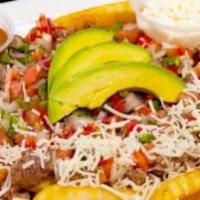 Carne Asada Fries · Black Angus Diced Beef Grilled to Perfection, over Crispy Fries, Shredded Cheese, Sour Cream...