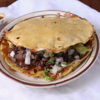 Mulita · Two yellow corn tortillas with cheese meat and more cheese.
