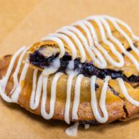 Sweet Hand Pies · A flaky pie crust filled with your choice of sweet filling. Drizzled with a brown butter gla...