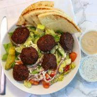 Falafel Salad · Deep fried falafel served with Greek salad, olives, Feta cheese, bread and tzatziki sauce or...
