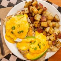 Sunrise Benedict · Toasted muffin, fresh grilled turkey, cheddar cheese and avocado, topped with two poached eg...