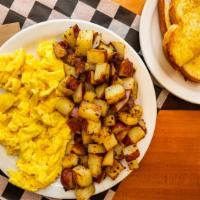 Z'S Early Riser · Two eggs any style with our signature hometyle potatoes and choice of toast or biscuits and ...