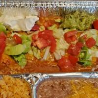Enchilada Supreme With Rice And Beans · Rolled flour tortillas filled with your choice of chicken, beef, cheese or refried beans, th...