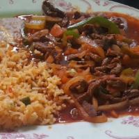 Steak Ranchero · Sliced pieces of sirloin steak fried with onion, green peppers, tomatoes and jalapenos peppe...