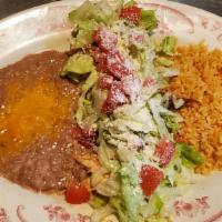 Sopitos · Three house made thick corn tortillas with your choice of chicken or beef, served open faced...
