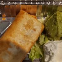 Chimichanga · Small deep fried burrito. Choice of chicken, ground beef or shredded beef, served with sour ...