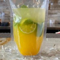 Mango Mojito · Bacardi rum • lime wedges • mint • mango purée • simple syrup • soda