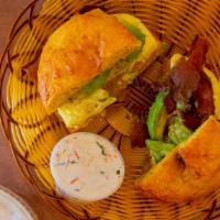 The Sonora Fiesta · Egg with jalapeños slices, cheddar cheese, bacon, avocado & a side of our authentic sonoran ...