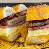 The Breakfast Ultimate · Egg with ham, bacon, sausage & cheddar cheese.