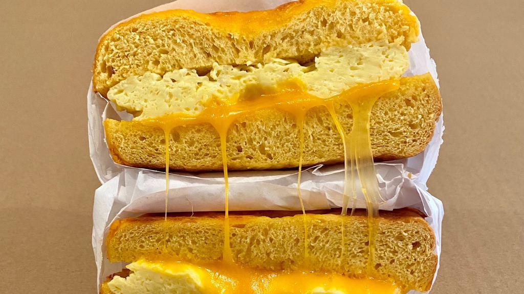 Egg & Cheese Sandwich · Egg with cheddar cheese.