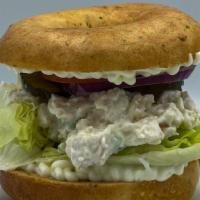 Chicken Salad Sandwich · Chicken mixed with mayo, green onion & celery with lettuce, pickles, red onion, & tomato.