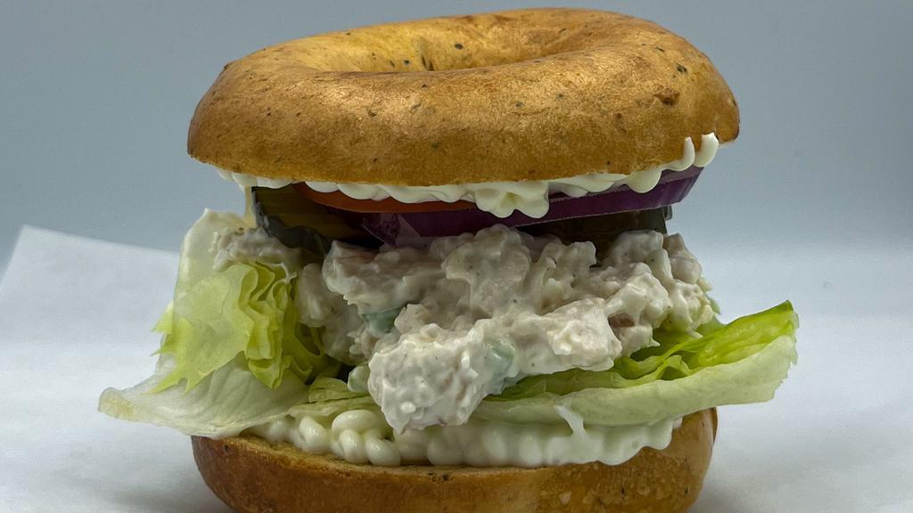 Chicken Salad Sandwich · Chicken mixed with mayo, green onion & celery with lettuce, pickles, red onion, & tomato.