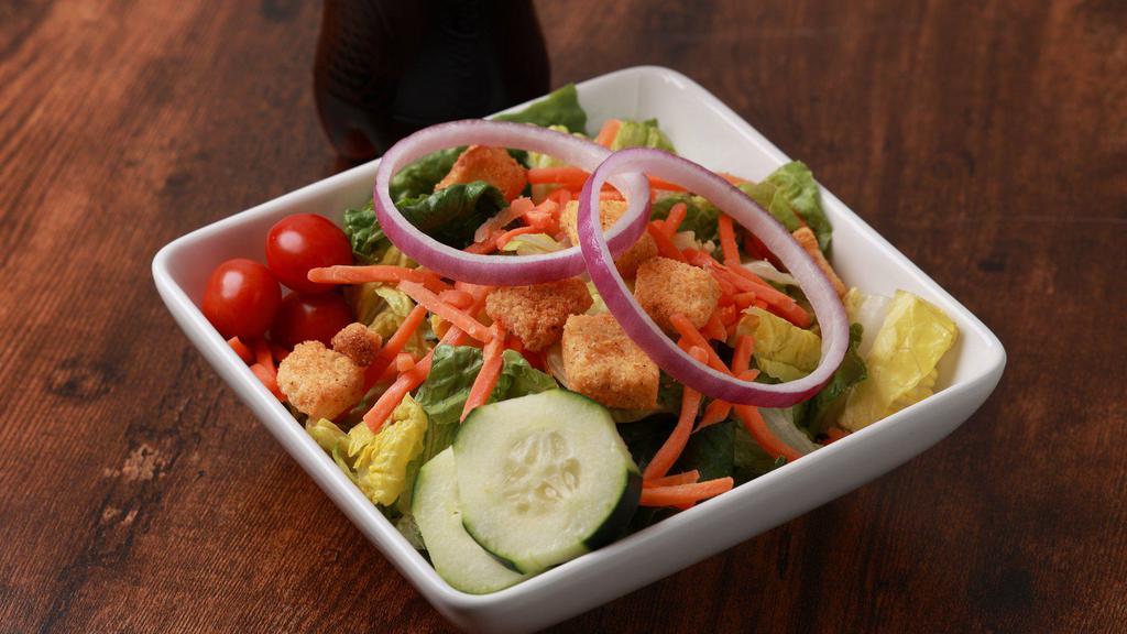 Side Kick Salad · Romaine, grape tomatoes, red onions, cucumbers, shredded carrots and croutons.  Served with your choice of dressing.
