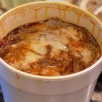 Birria Ramen · Ramen noodles, beef birria, consommé (beef broth), onions and cilantro, includes two mini qu...