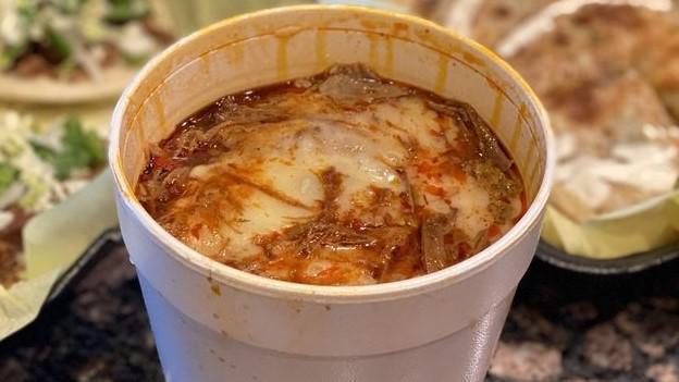 Birria Ramen · Ramen noodles, beef birria, consommé (beef broth), onions and cilantro, includes two mini quesadillas