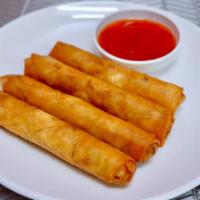 Spring Roll · Golden brown deep-fried spring roll stuffed with vegetables, served with plum sauce.