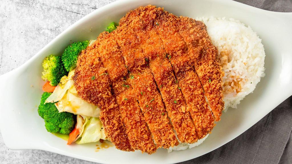 Chicken Katsu · Fried seasoned and breaded chicken breast, topped with our yummy 