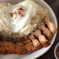 Lechon Kawali · Crispy pork belly. Deep fried pork belly, served with rice or garlic fried rice and egg.
