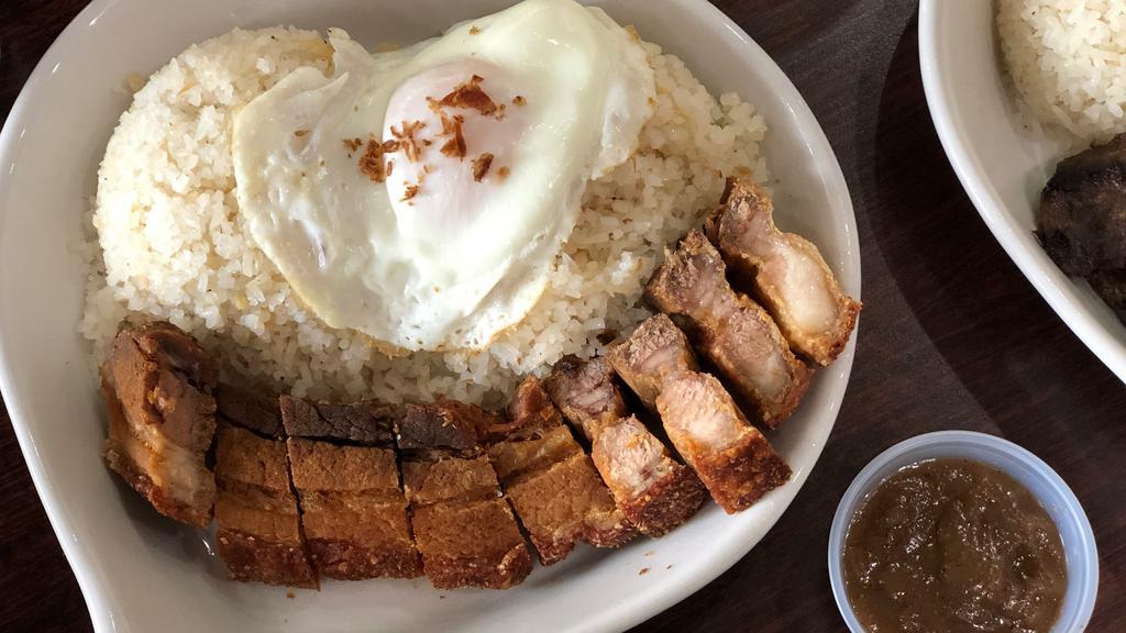 Lechon Kawali · Crispy pork belly. Deep fried pork belly, served with rice or garlic fried rice and egg.