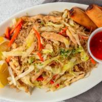 Pancit · Philippines noodle dish. Stir fried noodles with chicken meats and vegetables, comes with tw...