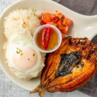 Bangsilog · Fried marinated bangus (milkfish), comes with steamed white rice or garlic fried rice and a ...