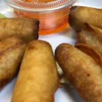 Spring Roll/Lumpiang Shanghai · Eight pieces of chicken or pork and vegetables egg roll.