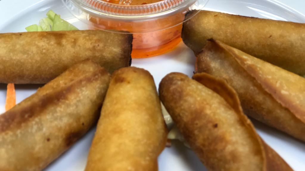 Lumpiang Shanghai · Eight pieces of chicken or pork and vegetables egg roll.