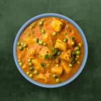 Perfect Potato & Peas · Delicious Indian dish with potatoes and peas slowly cooked in Indian herbs and spices in a s...