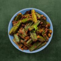 Okra Classic · Diced fresh okra, sautéed with onions, garlic and spices till crisp. Served with a side of p...