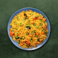 Classic Peas Pulao · Aromatic basmati rice cooked with green peas, fresh herbs, and Indian spices.