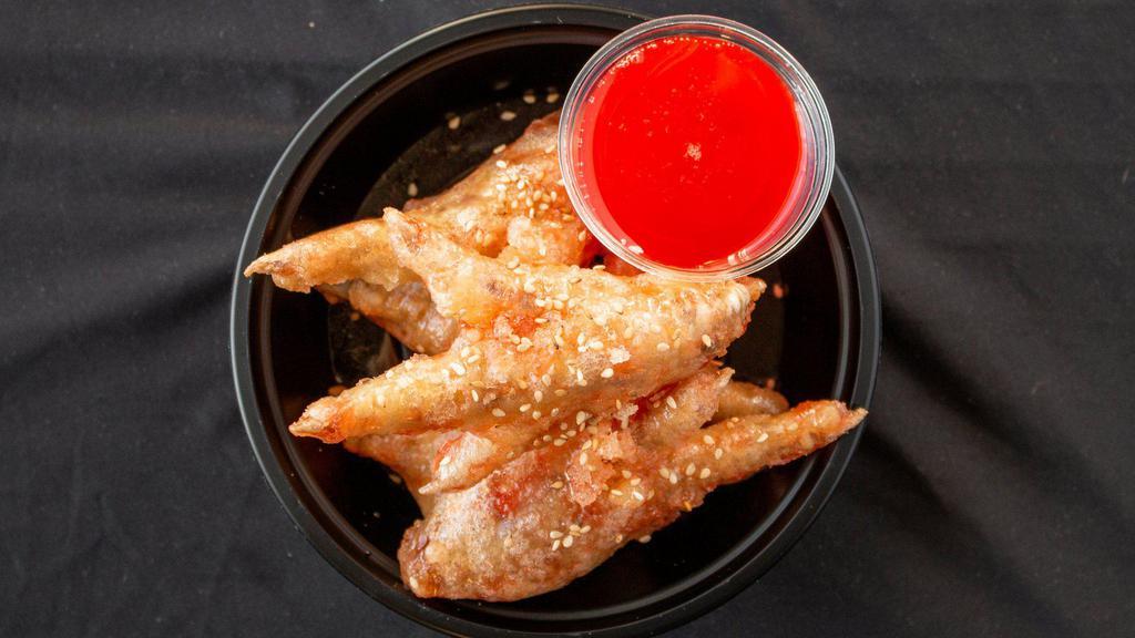Sweet & Sour Chicken Feet · Battered and fried chicken feet, served with sweet and sour sauce.