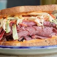 Pastrami Special Sandwich · Hot pastrami, Swiss cheese, coleslaw and 1000 Island on toasted rye. Includes a choice of si...