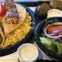 Greek Combo · Gyro sandwich (beef with lamb, chicken or veggie), and pork or chicken souvlaki; served with...