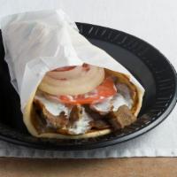 Gyro Sandwich · Thin sliced gyro meat (beef with lamb) rolled up in a grilled pita with tzatziki, tomato and...